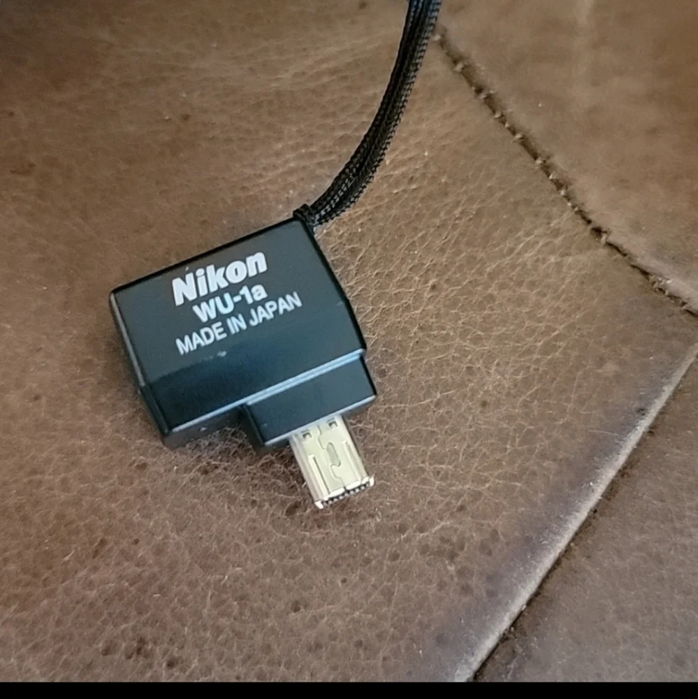 Nikon D3200 camera and 18-55 wide angle lense, and other extras